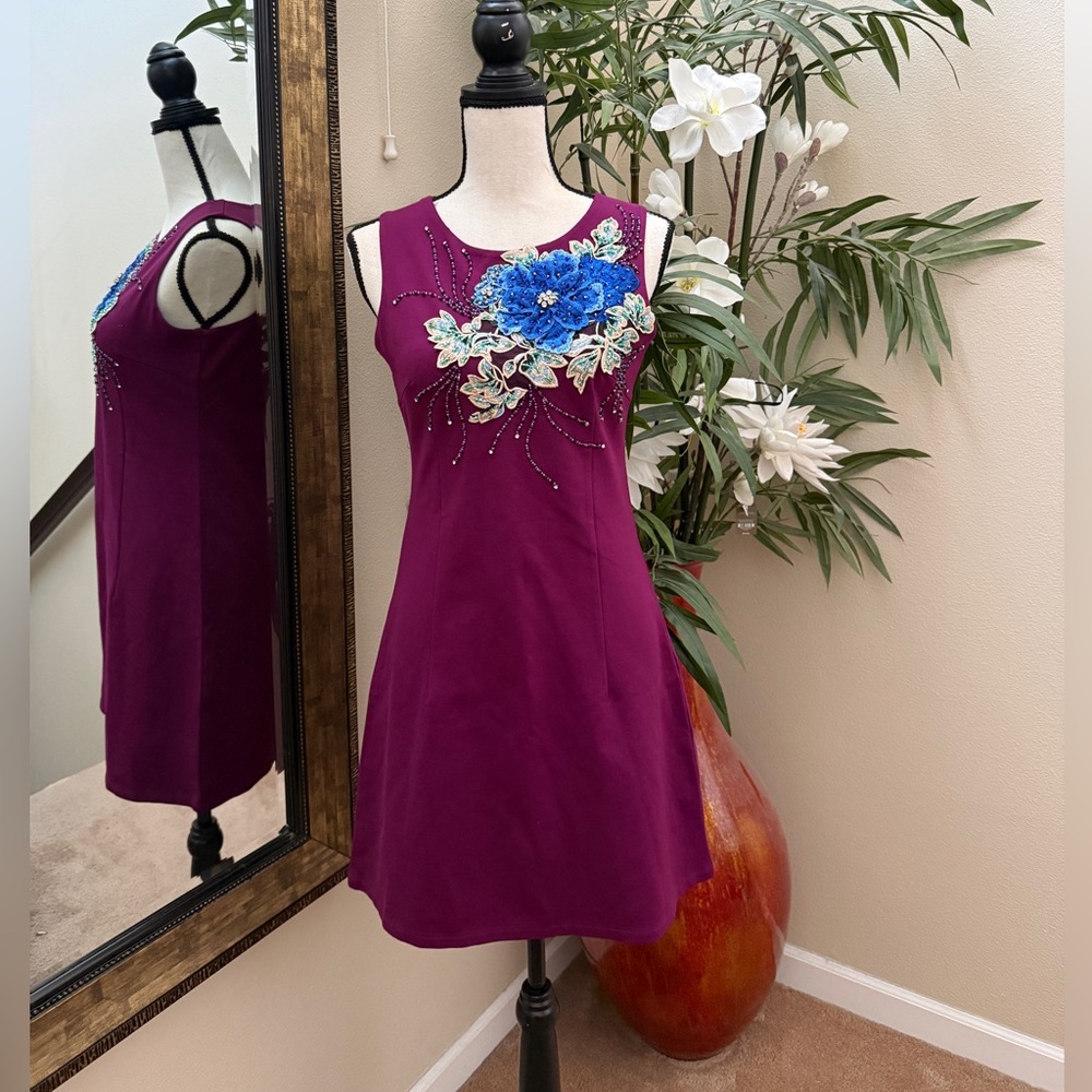 Elegant magenta sleeveless shift dress features floral embroidery beading NWT